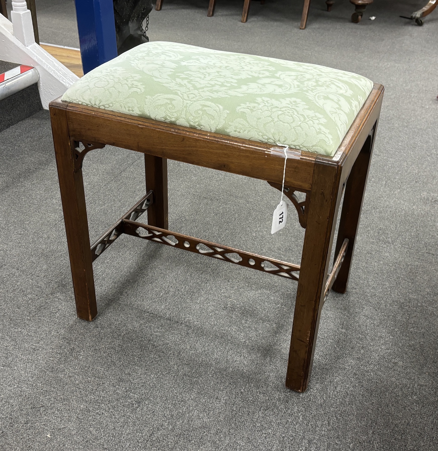 An Edwardian Chippendale Revival mahogany dressing stool, width 50cm, depth 35cm, height 50cm